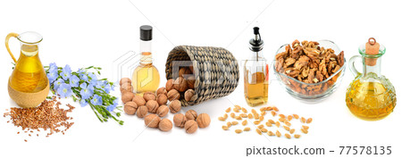 oils from walnut, flax seeds and pumpkin seeds isolated on white background. Collage. 77578135