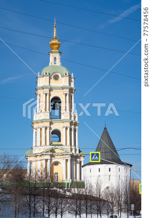 Bell tower of Novospassky monastery and white stone watchtower, Moscow Bell tower of Novospassky monastery and white stone watchtower, Moscow 77578456