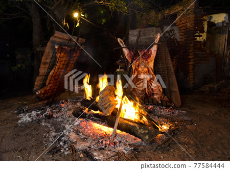 Lamb on the spit Lamb on the spit 77584444