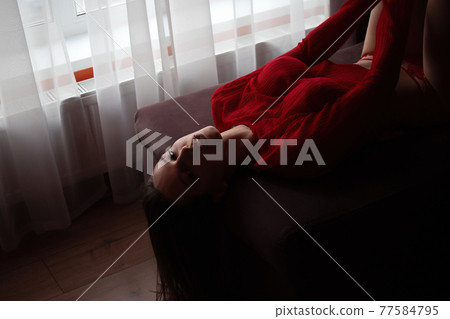Dreamy alluring woman in red lingerie 77584795
