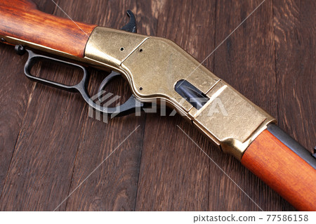 Old west gun - lever-action repeating rifle 77586158