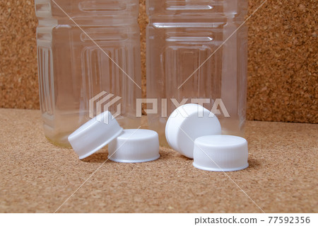 PET bottles, plastics, recyclable waste, caps, lids, recycled, empty PET bottles PET bottles, plastics, recyclable waste, caps, lids, recycled, empty PET bottles 77592356
