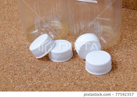 PET bottles, plastics, recyclable waste, caps, lids, recycled, empty PET bottles PET bottles, plastics, recyclable waste, caps, lids, recycled, empty PET bottles 77592357