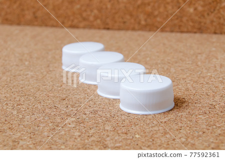 Caps, lids, PET bottles, plastics, recyclable waste, resources, recycling, environmental issues, resources Caps, lids, PET bottles, plastics, recyclable waste, resources, recycling, environmental issues, resources 77592361