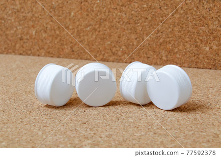Caps, lids, PET bottles, plastics, recyclable waste, resources, recycling, environmental issues, resources Caps, lids, PET bottles, plastics, recyclable waste, resources, recycling, environmental issues, resources 77592378