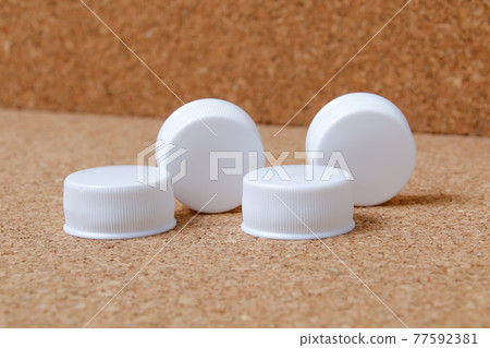 Caps, lids, PET bottles, plastics, recyclable waste, resources, recycling, environmental issues, resources Caps, lids, PET bottles, plastics, recyclable waste, resources, recycling, environmental issues, resources 77592381