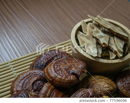 The lingzhi mushroom image close up for alternative medicine or medical and health concept. The lingzhi mushroom image close up for alternative medicine or medical and health concept. 77596096