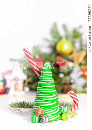 Caramel candy Christmas tree. Christmas card concept. Caramel candy Christmas tree. Christmas card concept. 77596274