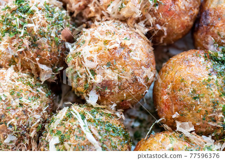 Freshly baked takoyaki 77596376