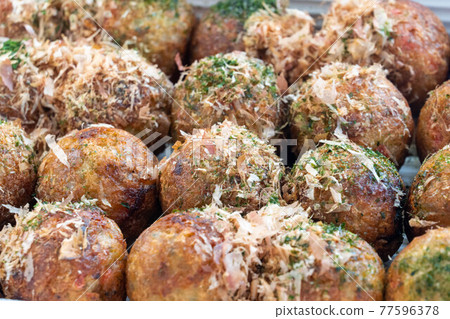 Freshly baked takoyaki 77596378