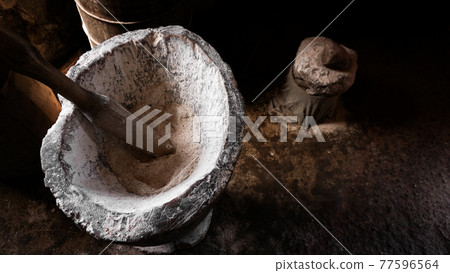 Ancient flour mortar. Wooden vessel for manual hand grinding. Authentic craft workshop 77596564