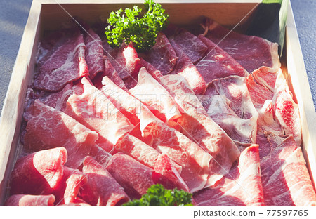 Raw red beef slice for Shabu and Sukiyaki Japanese style. Can use to create menu in the restaurant. 77597765