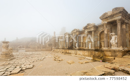 Ruins of antique city of Sagalassos with Antonine Nymphaeum. Ruins of antique city of Sagalassos with Antonine Nymphaeum. 77598452