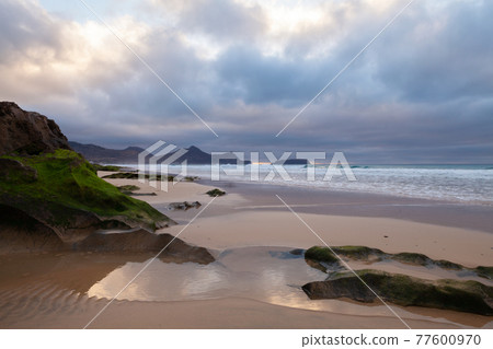 Landscape with coastal rocks. Beach of Porto Santo 77600970