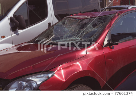 car after a car accident at a junkyard 77601374