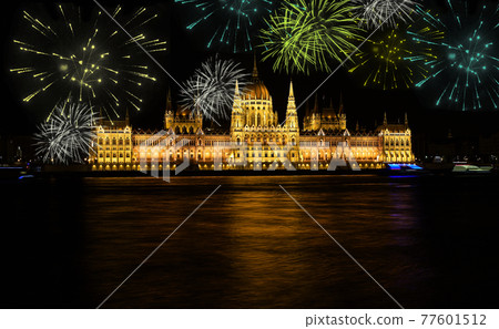 Fireworks over Budapest parliament at night 77601512