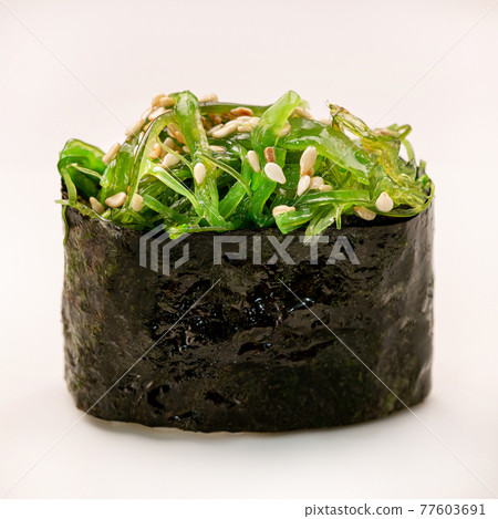 Chukka gunkan seaweed sushi maki on white background. Delicacy gourmet snacks. Chukka gunkan seaweed sushi maki on white background. Delicacy gourmet snacks. 77603691