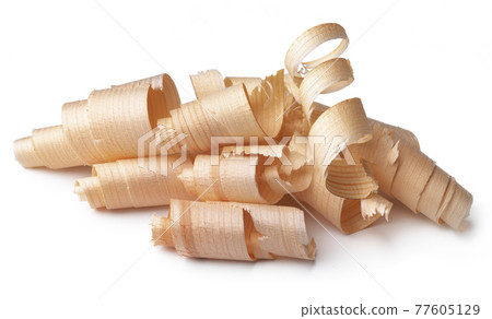 Wood shavings isolated on white background Wood shavings isolated on white background 77605129