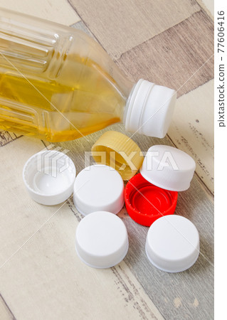 PET bottles, plastics, tea, drinks, caps, lids, drinking water, recyclable waste, resources, recycling, environment 77606416