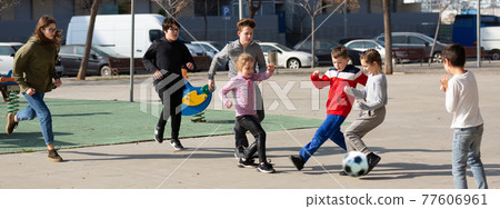 Children playing soccer with ball Children playing soccer with ball 77606961