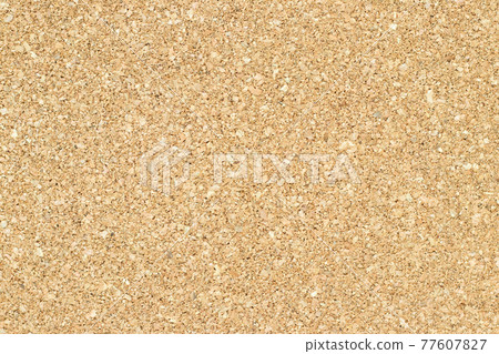 Closed up of brown color cork board textured background 77607827