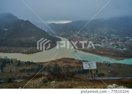 Amazing natural landscape. The confluence of two rivers in the city of Mtskheta in Georgia Amazing natural landscape. The confluence of two rivers in the city of Mtskheta in Georgia 77610104