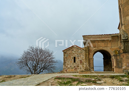 An old stone fortress in the mountains An old stone fortress in the mountains 77610105