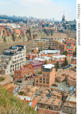 Popular city landmark in Tbilisi. Ancient underground complex of sulfur baths Popular city landmark in Tbilisi. Ancient underground complex of sulfur baths 77610243