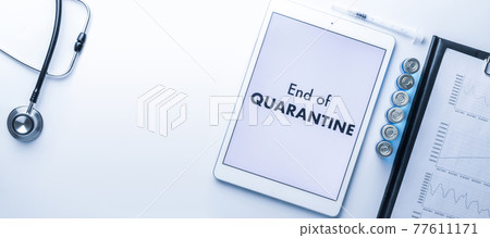 Quarantine is over. Syringe with needle, hospital healthcare charts, doctor stethoscope and white tablet with text on screen for medical equipment background. End of quarantine concept. Quarantine is over. Syringe with needle, hospital healthcare charts, doctor stethoscope and white tablet with text on screen for medical equipment background. End of quarantine concept. 77611171