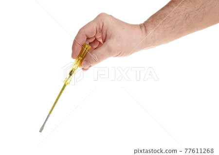 Hand holds a screwdriver on a white background, a template for designers. 77611268