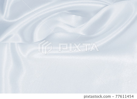 Smooth elegant grey silk or satin luxury cloth as wedding background. Luxurious background design Smooth elegant grey silk or satin luxury cloth as wedding background. Luxurious background design 77611454