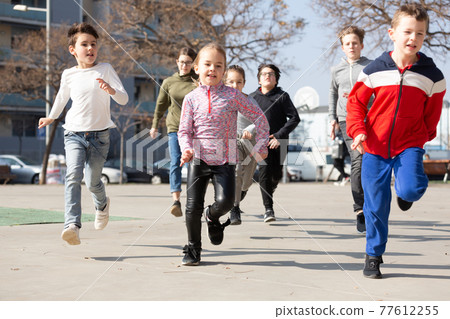 Activity children compete in the city street Activity children compete in the city street 77612255