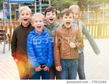 Five little friends posing on the playground Five little friends posing on the playground 77612268