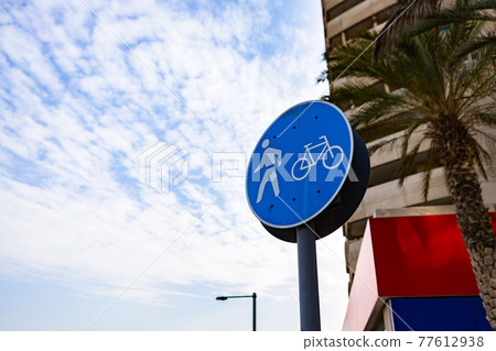 Bicycle and pedestrian shared route sign in Dubai Bicycle and pedestrian shared route sign in Dubai 77612938