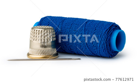 Tailor, needles and threads over white background 77612971