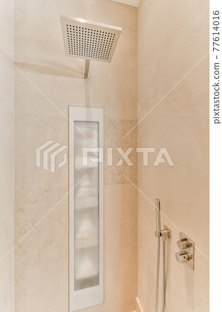 Modern rain shower set in bathroom Modern rain shower set in bathroom 77614016