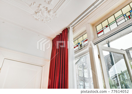Stucco decor on ceiling in classic style apartment Stucco decor on ceiling in classic style apartment 77614052
