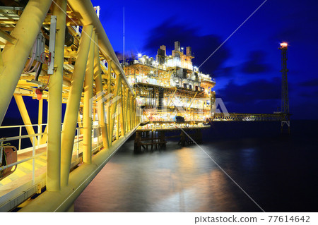 Offshore construction platform for production oil and gas. Oil and gas industry and hard work. Production platform and operation process by manual and auto function from control room. Offshore construction platform for production oil and gas. Oil and gas industry and hard work. Production platform and operation process by manual and auto function from control room. 77614642