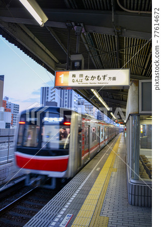 Platform of Osaka Metro Higashimikuni Station 77614672