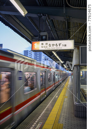 Platform of Osaka Metro Higashimikuni Station 77614675
