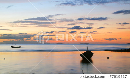 Fishing boat in the sea at sunrise Fishing boat in the sea at sunrise 77619517