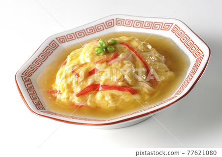 Chinese style omelet rice with red bean paste, Tianjin rice photographed on a white background Chinese style omelet rice with red bean paste, Tianjin rice photographed on a white background 77621080