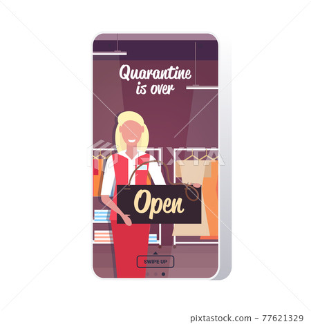 female shop assistant holding open sign board coronavirus quarantine is ending victory over covid-19 female shop assistant holding open sign board coronavirus quarantine is ending victory over covid-19 77621329
