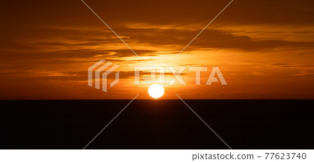 Sunset over the sea or Glowing sea sunrise. 77623740