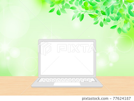 一個簡單的銀色筆記本電腦,帶有新鮮的綠色背景和一個開放的灰色白鍵 一個簡單的銀色筆記本電腦,帶有新鮮的綠色背景和一個開放的灰色白鍵 77624187