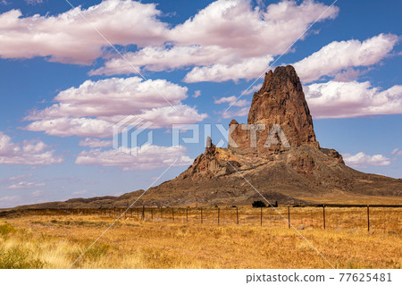 Rocky mountains around Monument Valley 77625481