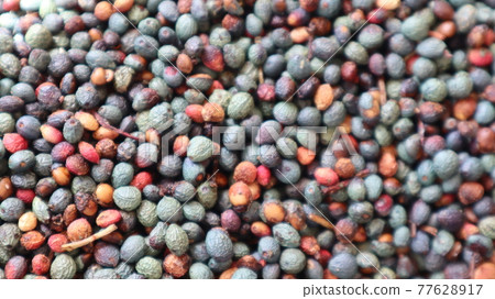 Close-up Menengic seeds (Terebinth Tree seeds) background. Colorful little menengic coffee seeds background 77628917
