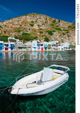 Greek fishing boat in the aegean sea, Greece. Greek fishing boat in the aegean sea, Greece. 77632645