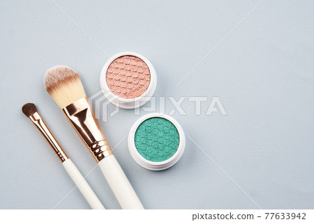 eyeshadow accessories beads makeup brushes collection professional cosmetics on gray background eyeshadow accessories beads makeup brushes collection professional cosmetics on gray background 77633942