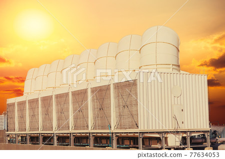 HVAC Air cooling system. heat exchanger water chiller tower for office building air conditioner against hot weather sky background. 77634053